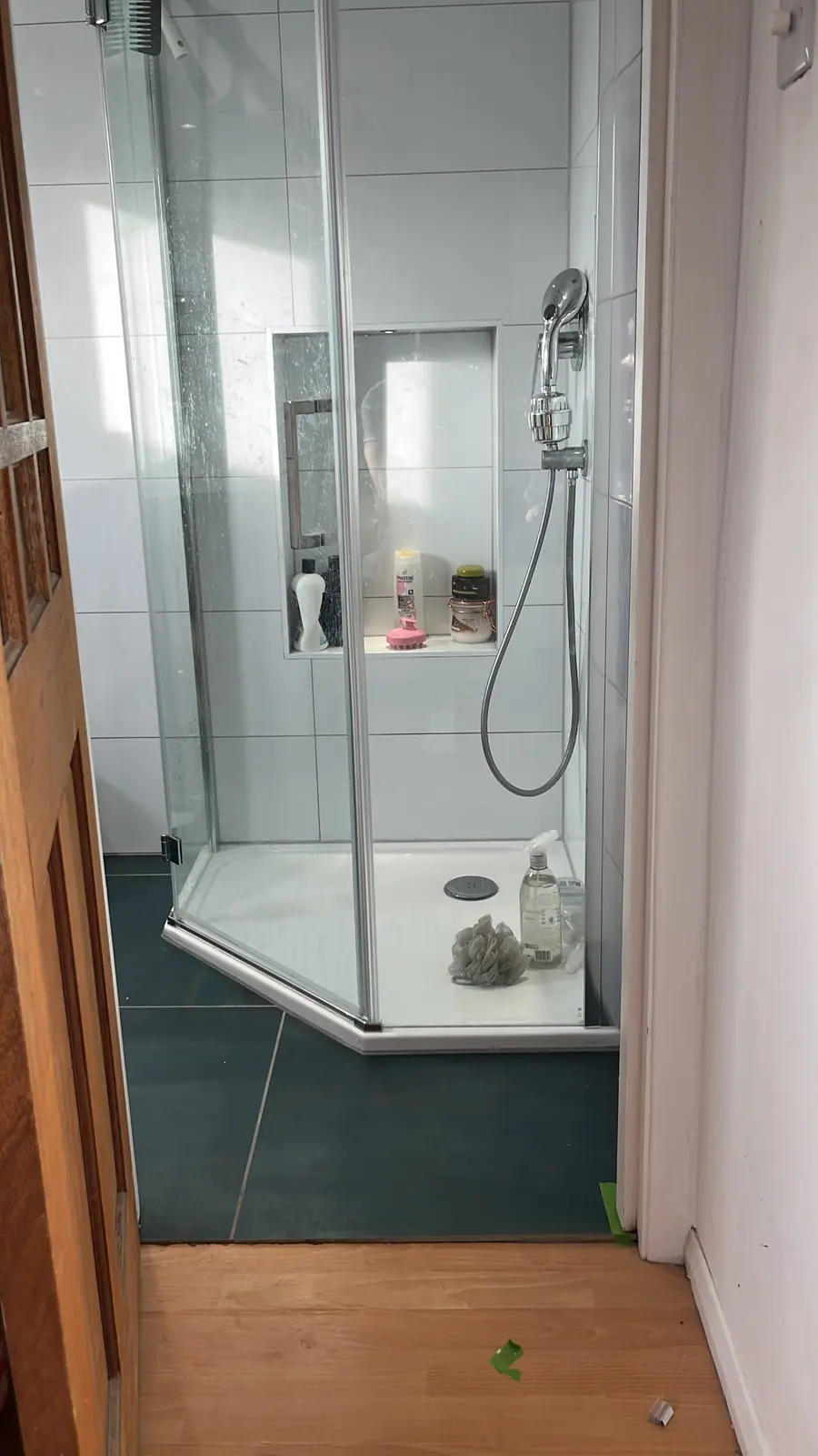 The new shower enclosure seen through the doorway