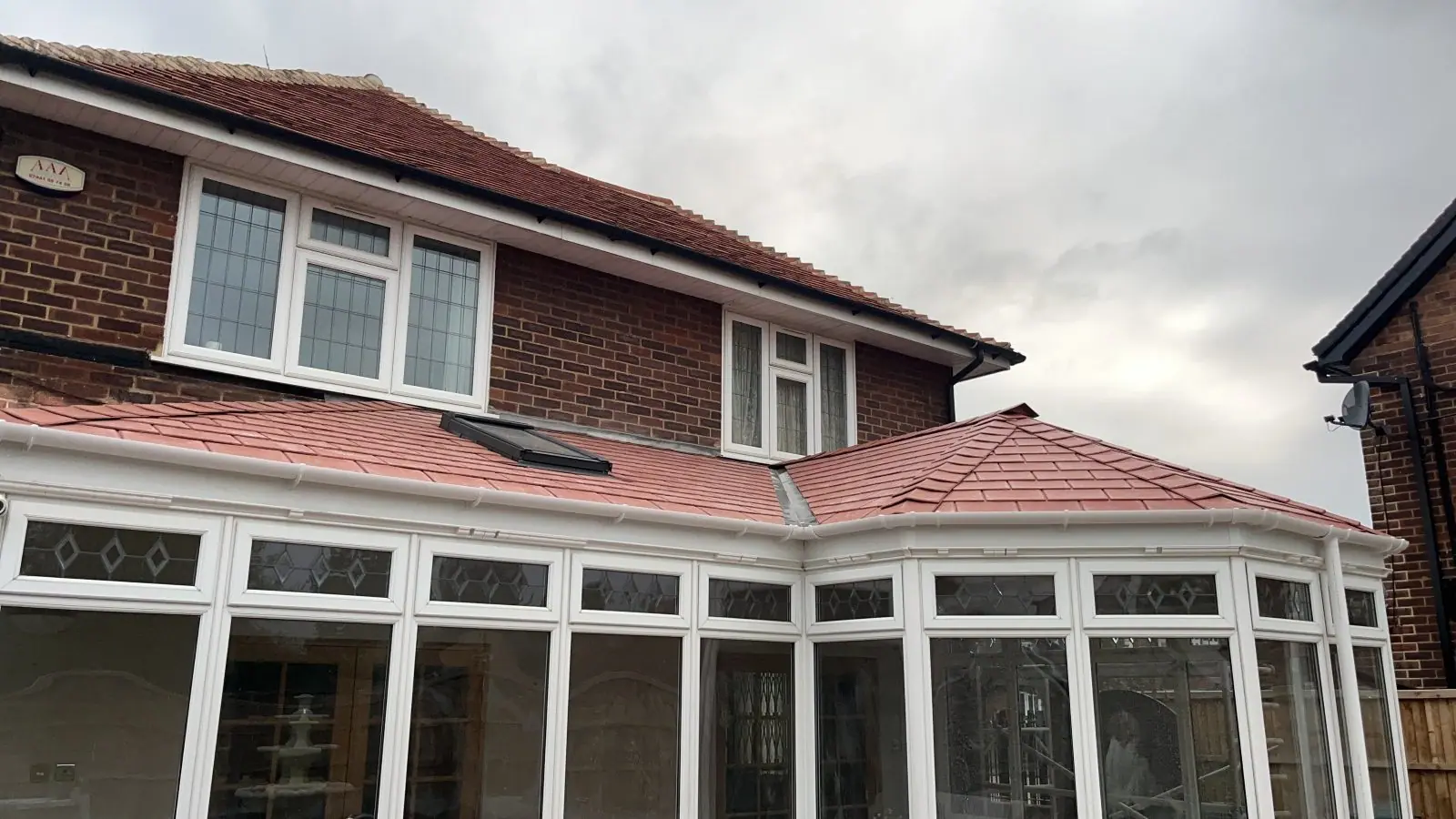 The finished conservatory under its new solid terracotta tiled roof