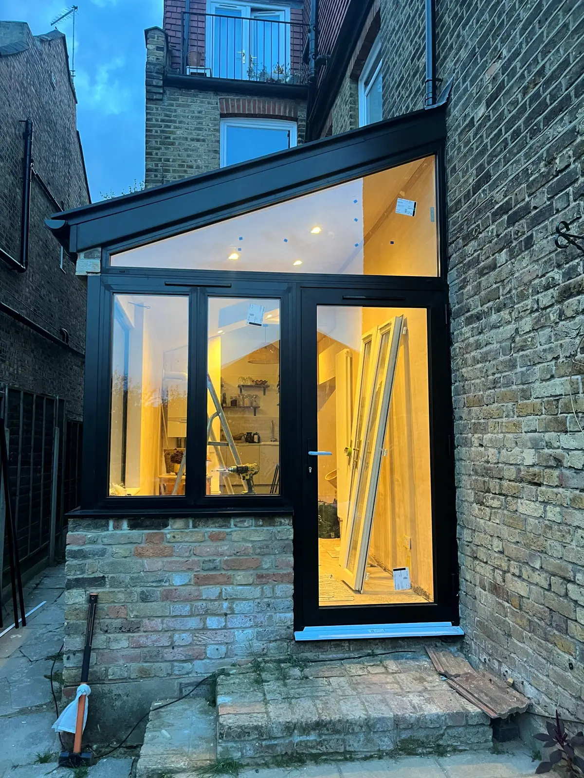 The finished glazing with the room lit inside