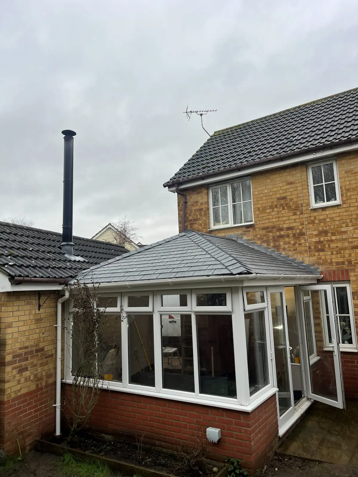 The new roof seen from the side of the house