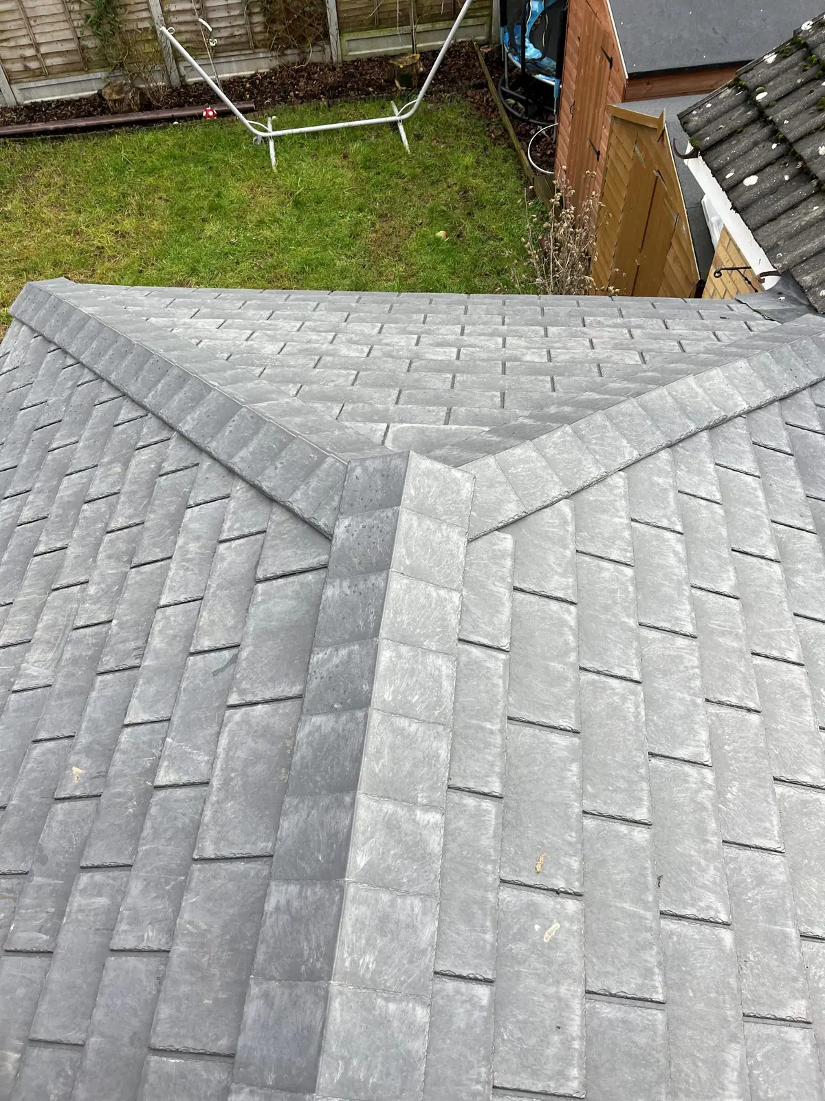 Close view of the tile courses meeting the hip