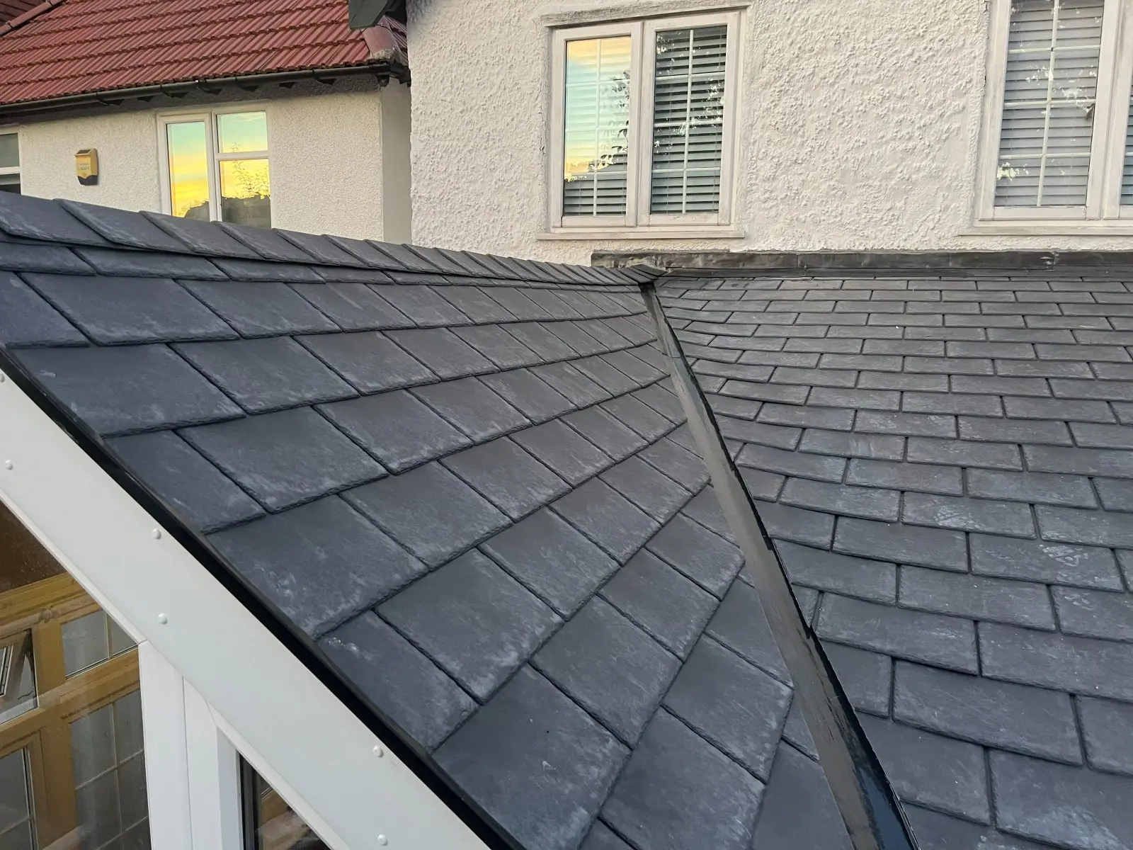 Close view of the slate-grey tile courses