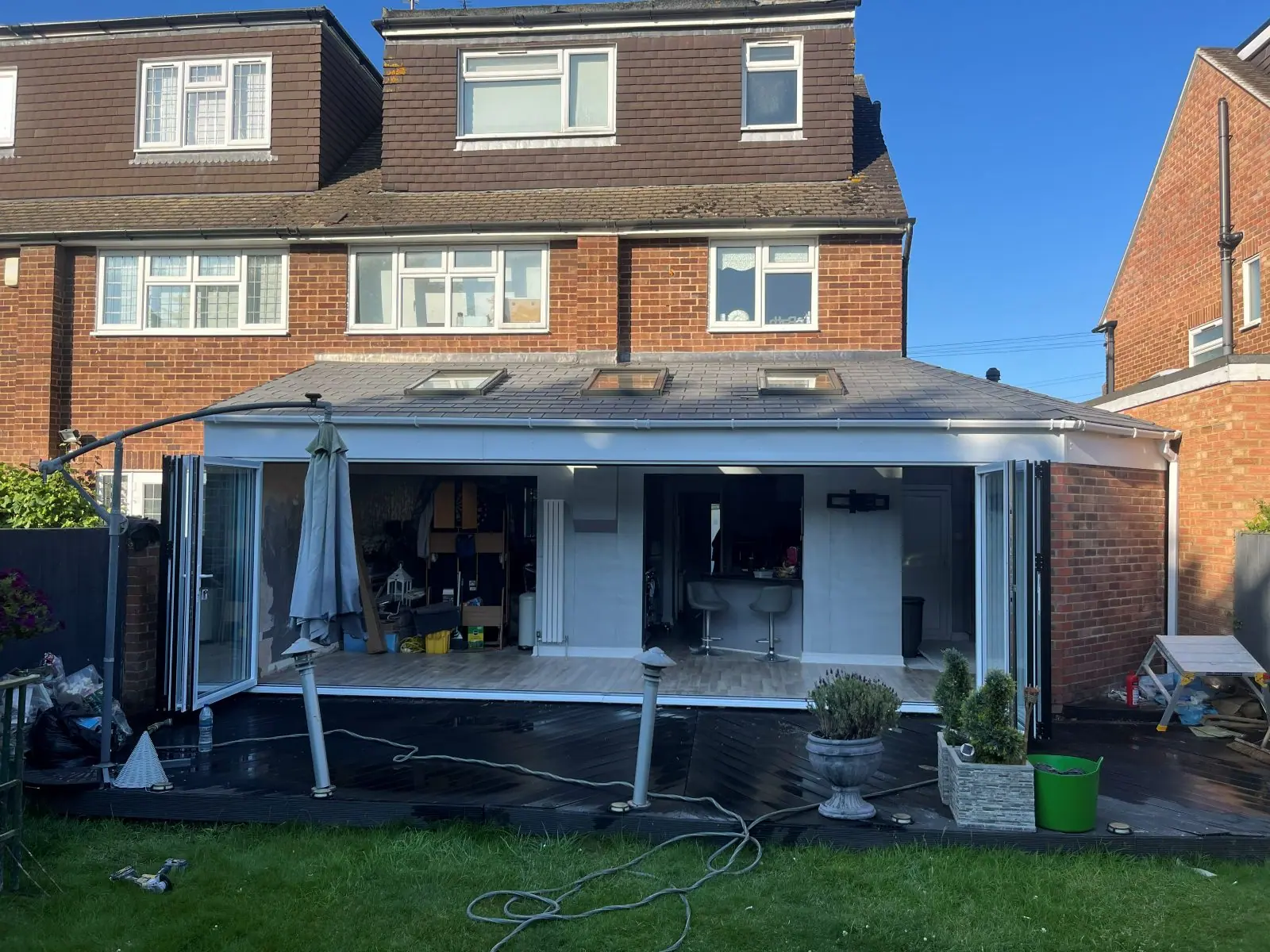 The rear room with the bi-fold doors folded back