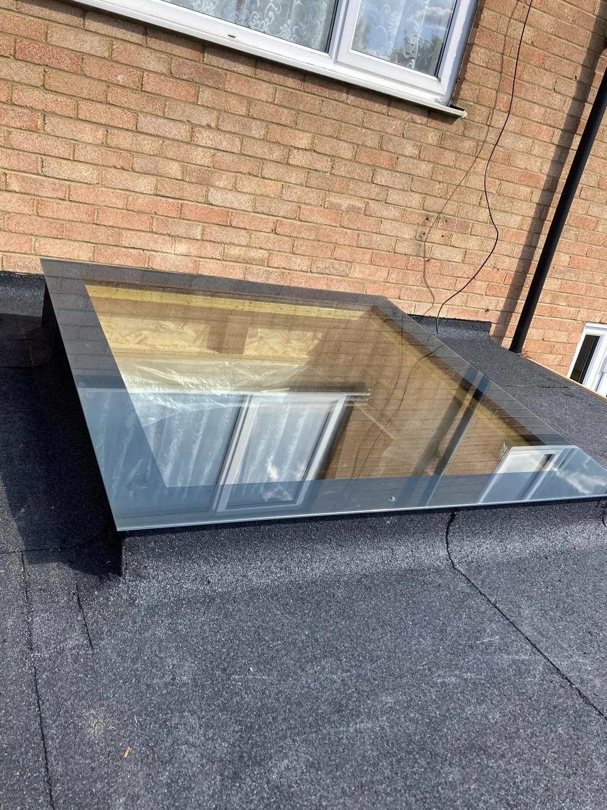 The flat roof light set into the new membrane