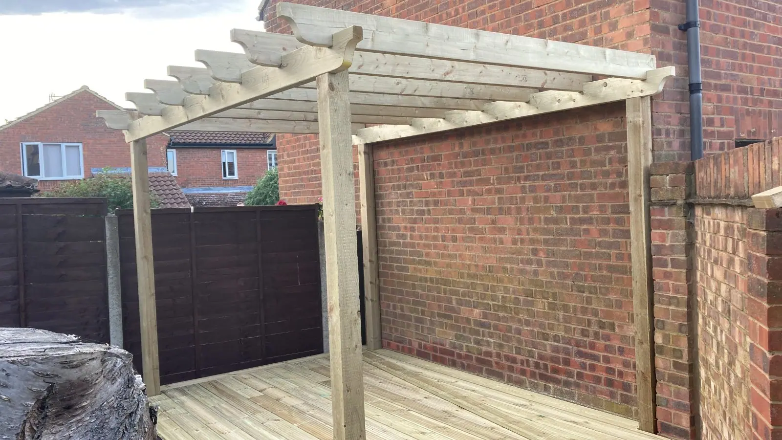 The pergola from the side, showing the rafter tails