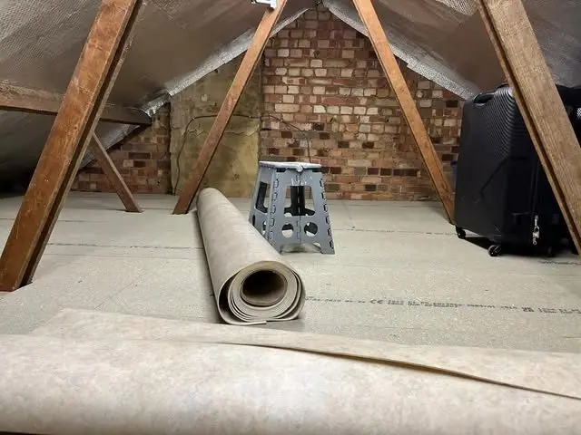 The same loft boarded out with a protective covering laid over the new boards