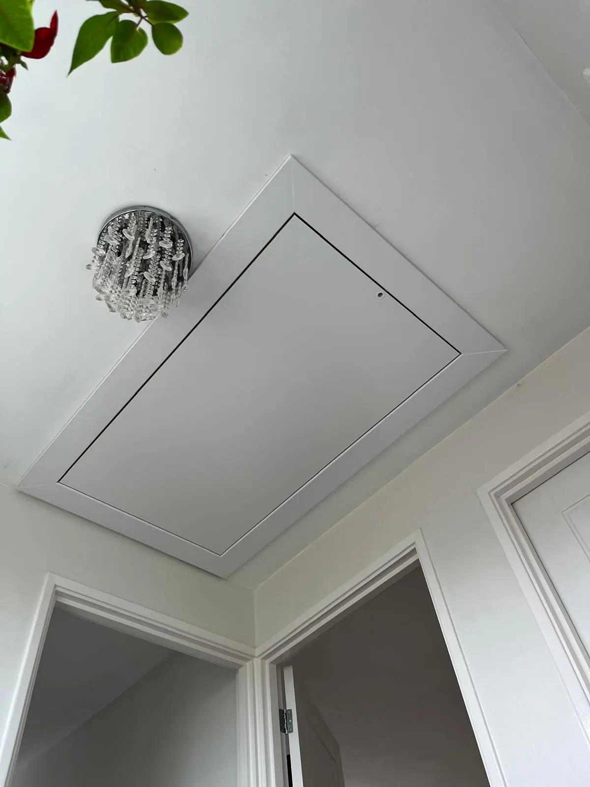 A new flush loft hatch set into the landing ceiling